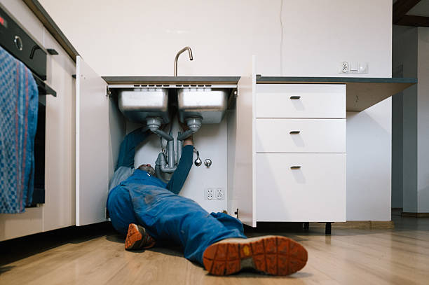 Professional Drain Cleaning technician working in Kansas, OK